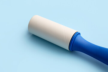 Lint roller on color background