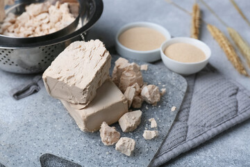 Composition with fresh and dry yeast on light background