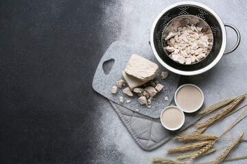Composition with fresh and dry yeast on black and white background