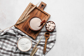 Composition with fresh and dry yeast on light background