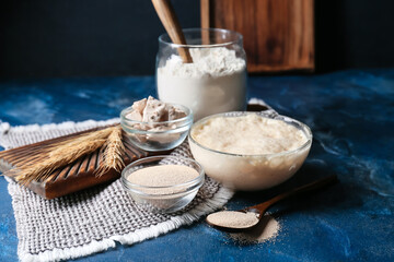 Composition with fresh and dry yeast on color background