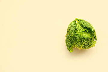 Fresh savoy cabbage on color background