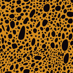 Black spots on an orange background in the shape of a leopard. Seamless, vector.