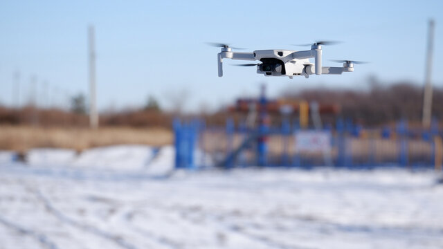 Winter, control of remote objects of the enterprise using a quadrocopter. Selective focus.