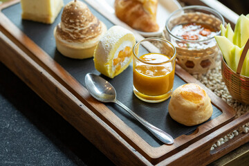 Many kinds of sweets made from mango, sweet thai dessert cuisine made from sticky rice, mango, coconut, Sliced mango with sweet and salty sauce that made of tiny shrimp with fish sauce and sugar, 