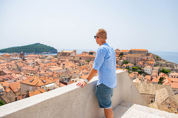 Visitors in Dubrovnik old city. Dubrovnik city walls, one of the world heritage