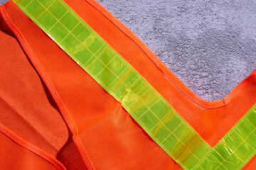 close up of orange color safety vest