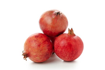 Ripe pomegranate fruits isolated on white background