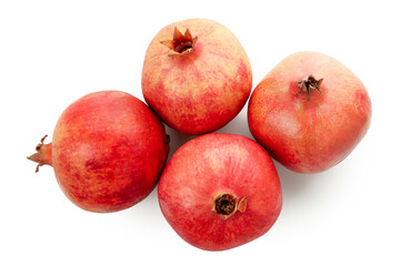 Ripe pomegranate fruits isolated on white background