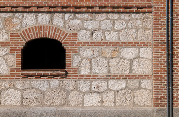 Detail of a brick wall with window