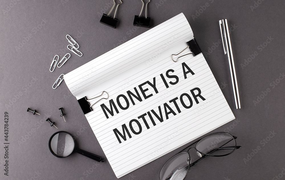 Aufkleber notebook with tools and notes with text imoney is a motivator , business concept
