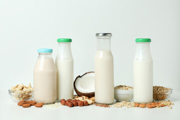 Obraz na płótnie Canvas Concept of vegan milk on white background
