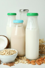 Concept of vegan milk on white background