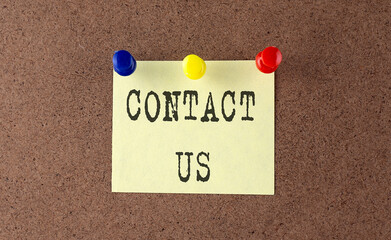 CONTACT US text written on the Message Board. Memo