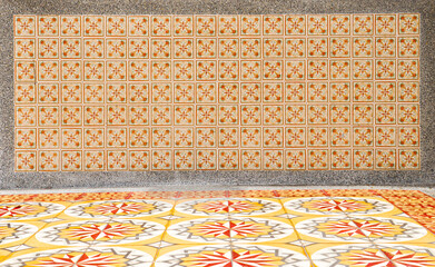 Orange and Green Peranakan tile facade.