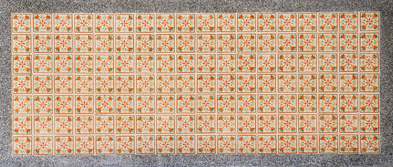 Orange and Green Peranakan tile mosaic.