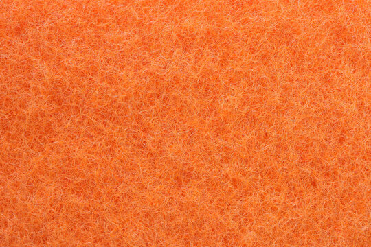 Background of orange scotch brite closeup. 