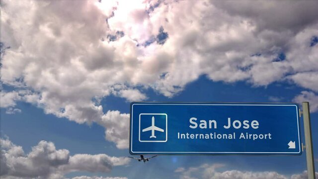 Jet plane landing in San Jose, California, Costa Rica. City arrival with airport direction sign. Travel, business, tourism and transport concept.