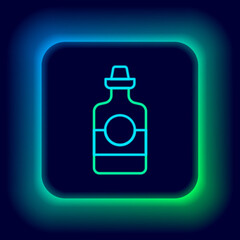 Glowing neon line Tequila bottle icon isolated on black background. Mexican alcohol drink. Colorful outline concept. Vector