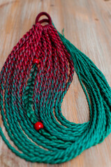 Hair accessory, colored braids of red and green artificial hair