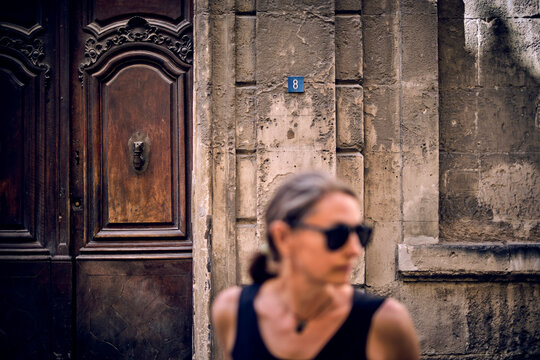 Woman in front of door