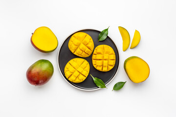 Mango slices and cubes in plate for fresh summer dinner