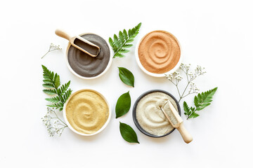 Clay mud cosmetic mask in bowl for spa beauty treatment