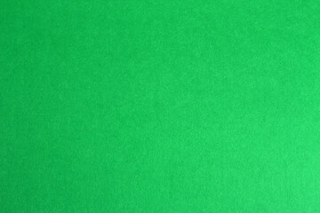 Empty copy space from green colored sheet paper background