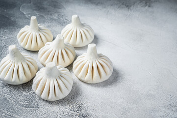 Georgian Raw dumpling Khinkali with meat. White background. Top view. Copy space