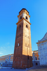 Obraz premium Bell tower stands next to the Turin Cathedral . Campanile Duomo Di Torino