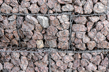 Gabion structure. Cage boxes filled with rocks