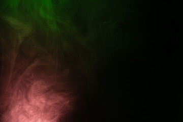 Green and pink steam on a black background.