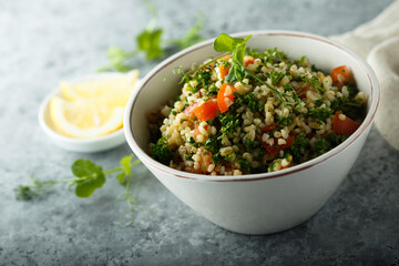 Traditional Tabbouleh salad with parsley and tomato