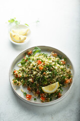Traditional Tabbouleh salad with parsley and tomato