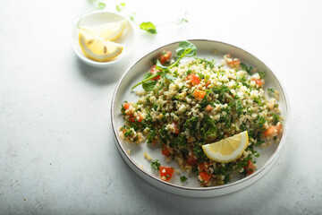 Traditional Tabbouleh salad with parsley and tomato