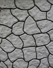 background of the layout of gray stones in close-up