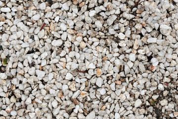 White pebble close up image, stone texture background.