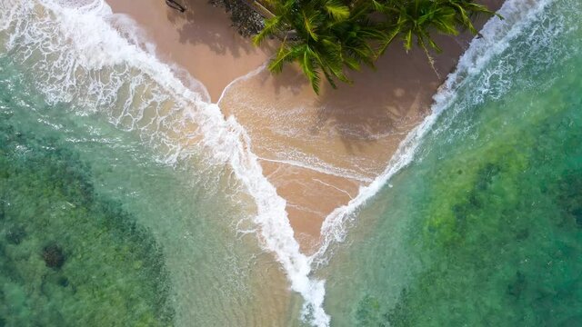 Beach sea in summer sun Aerial view Top-down shot. Phuket, Thailand 4K Nature and travel concept. Shot on drone high quality camera.