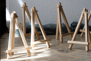 Fototapeta na wymiar Photos of mini stands easels made of wood