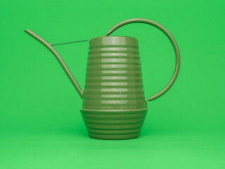 Waterican Can - Isolated Green Background - Close Up Watering Jug Background - Gardening ecology flower © Studiofy