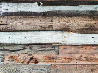 Obraz premium Old weathered wooden barrels planks background