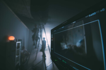 Film set, monitors and modern shooting equipment.