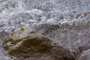 clear water stone rock sea. Stones and water background