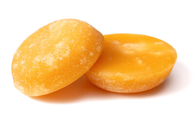two cakes of palm sugar isolated on white background