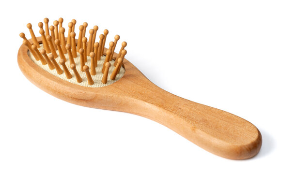 One Wooden Paddle Hairbrush Isolated On White