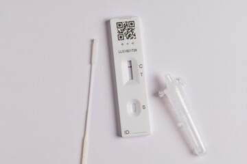 Coronavirus lateral flow self test kit on white background showing negative result - obrazy, fototapety, plakaty