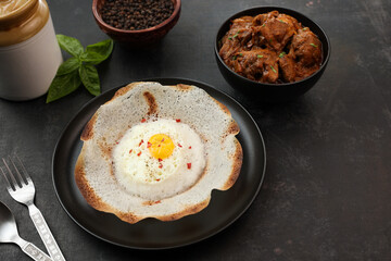 Sri lankan egg hopper, bittara aappa Appam popular breakfast Pancake Made With Fermented Rice Batter, Coconut Milk Sri Lanka South Indian  Kerala, Tamil Nadu. Indian veg food. 