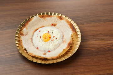 Sri lankan egg hopper, bittara aappa Appam popular breakfast Pancake Made With Fermented Rice Batter, Coconut Milk Sri Lanka South Indian  Kerala, Tamil Nadu. Indian veg food. 