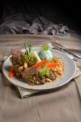 stewed beef steak with baked bean and blue pea butterfly flower rice Peruvian cuisine menu