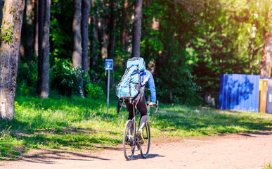 Fototapeta premium Cyclist ride on the bike path in the city Park 